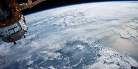 A view of Earth and the International Space Station from outer space